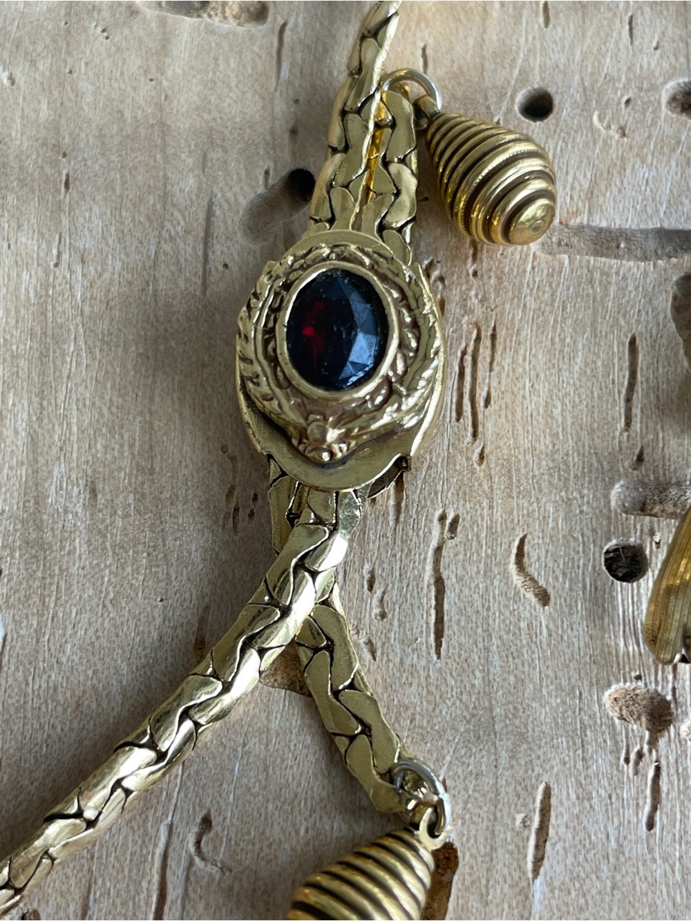 Gold Tone Bracelet with Red Stone Accent